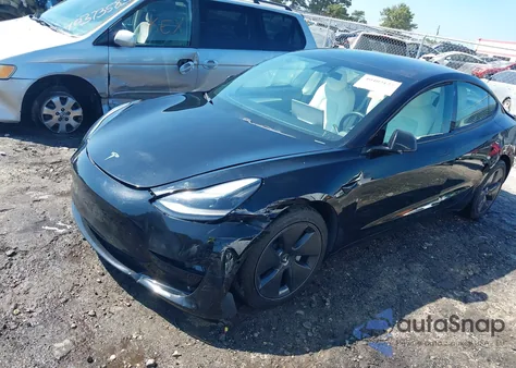2021 Tesla Model 3 Standard Range Plus Rear-Wheel Drive from USA, damaged, VIN 5YJ3E1EA7MF084492